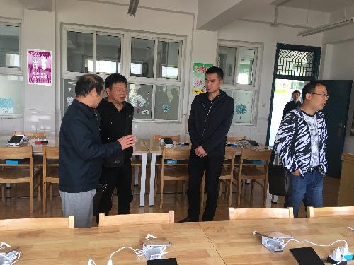 [百炼实初]满洲里市教育局团队到我校交流研讨：“码上慧学”特色项目