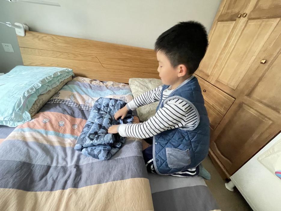2023.1.15叠衣服新闻稿(1)_html_21256c5e.jpg