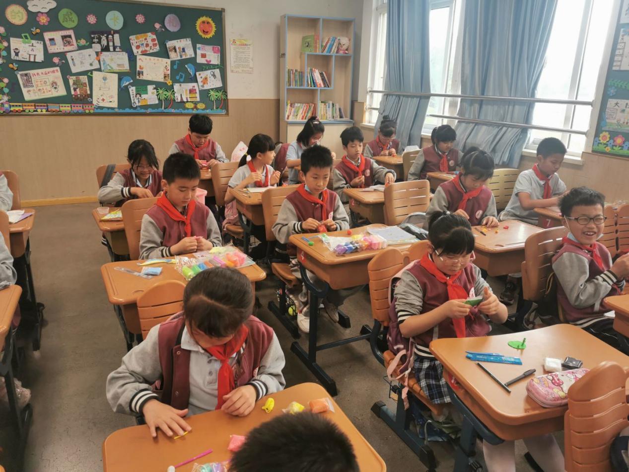 报道：道德与法治“传统文化之泥塑”_html_m5b1019d7.jpg
