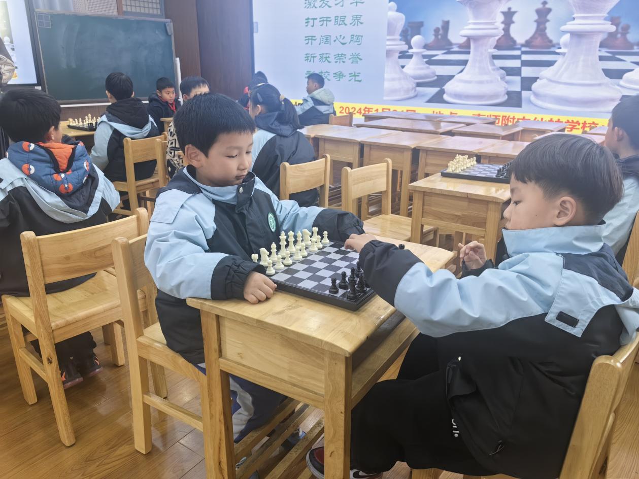 2014.1.5【尚美迈小 学科研究】国际象棋热身赛_html_51cf5eb3.jpg