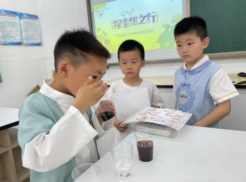 无纸化测评丁三小学活动侧记(新)_html_m5f56cf74.jpg