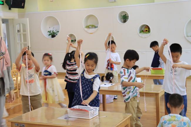 以赛角逐艺，共研亲生命——迈幼教育集团集体教学评比活动新闻稿(1)_html_m31abdb5f.jpg
