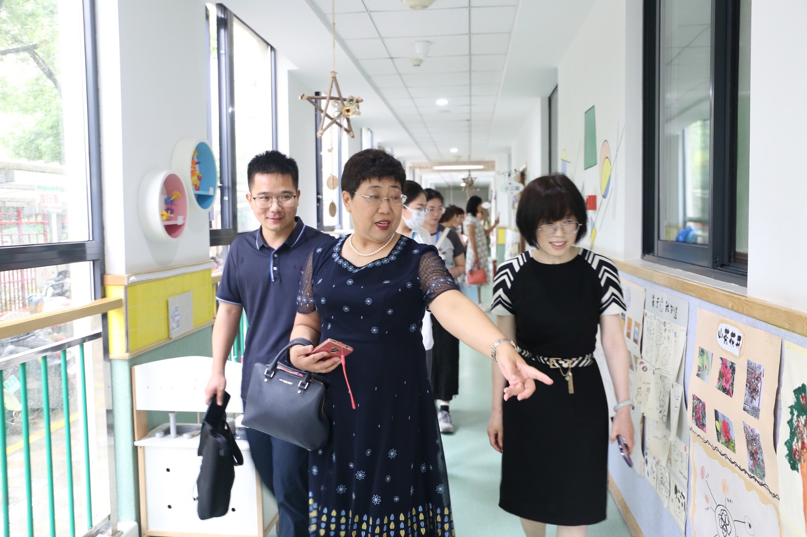 【乐活龙幼】与“活教育”同行，育活泼泼儿童——记龙潭幼儿园龙岸分园户外混龄游戏全国开放活动