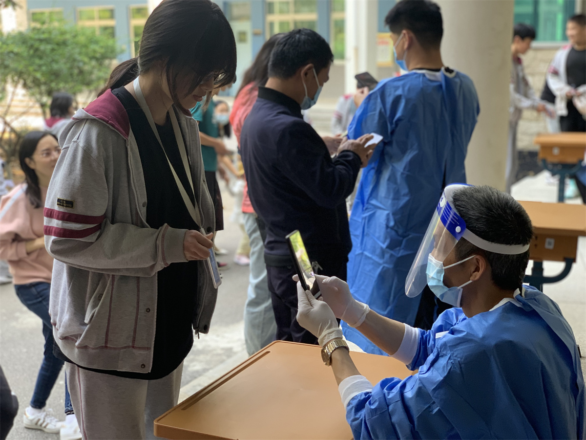 2022.5.3核酸检测筑防线，志愿活动显担当_html_ef6389b.jpg