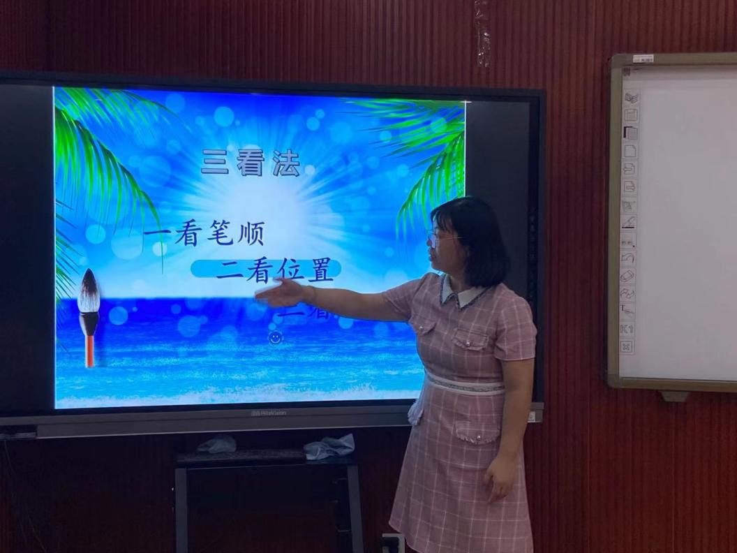 【丁香汉声】彰显学校写字特色，续谱书法育人篇章_html_55e3b11e.jpg