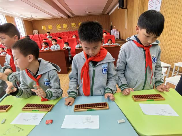 20240409启智珠算节二年级年级赛报道_html_28a8423f.jpg
