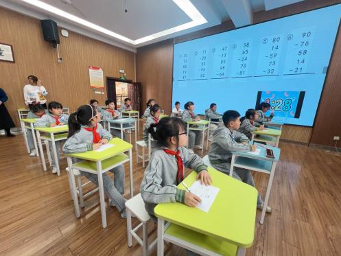 20240411启智珠算节三年级年级赛报道_html_me9468d1.jpg