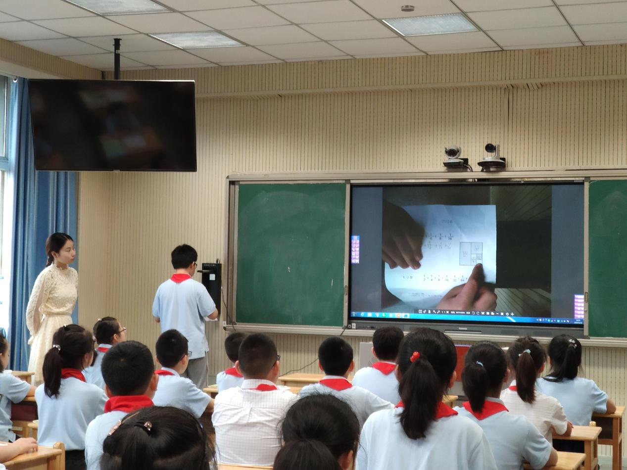 五年级数学教研报道_html_4f7f547d.jpg