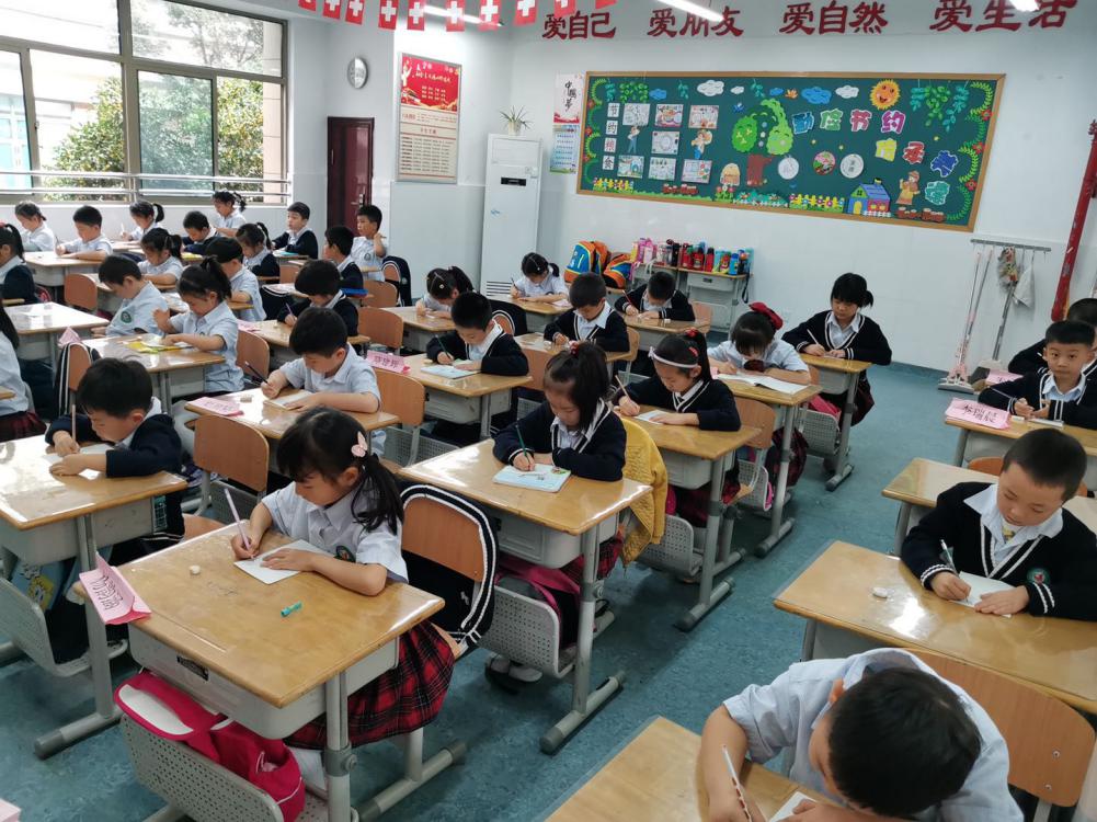 “正学好榜样,写好规范字”(2)_html_5b9a471f.jpg