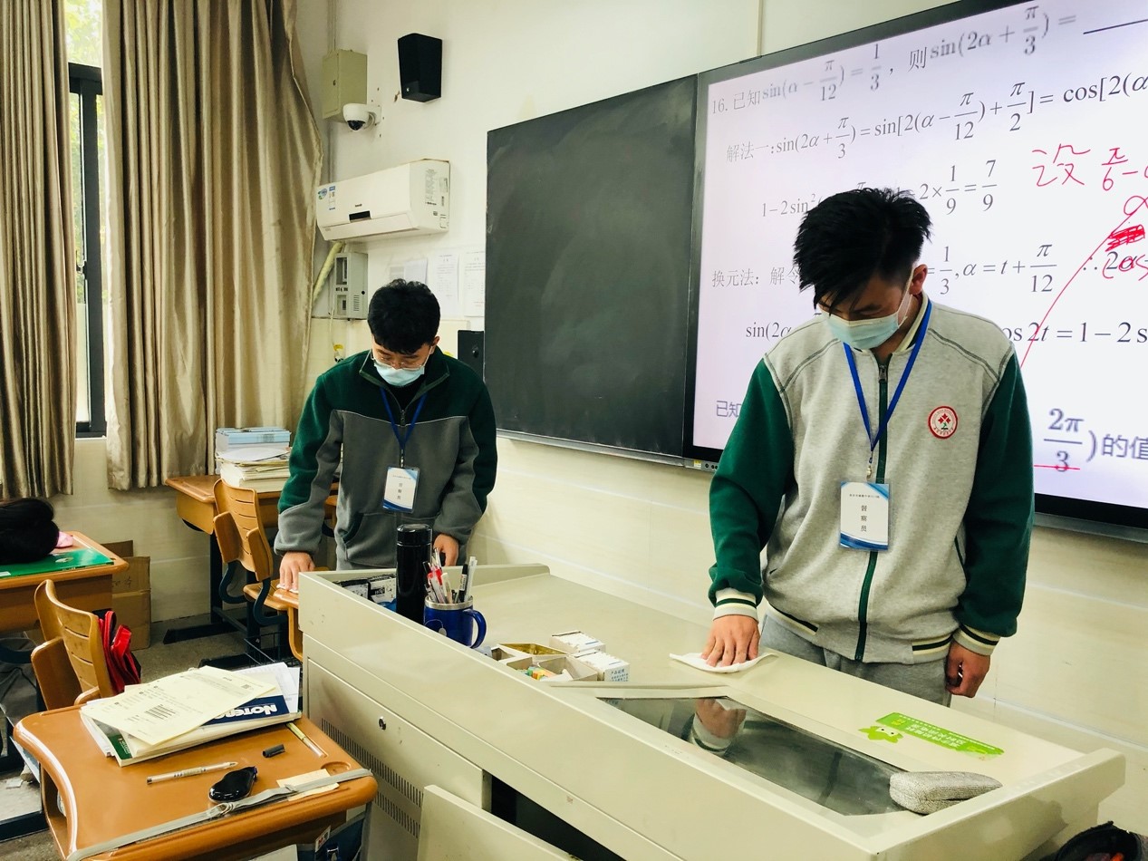 【毅行栖中】督导疫情防控 确保复学安全