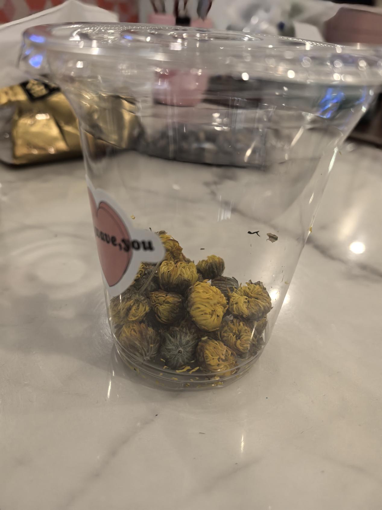 【博学广志】百草园里展风采 巧手烘制菊花茶_html_180f179f.jpg