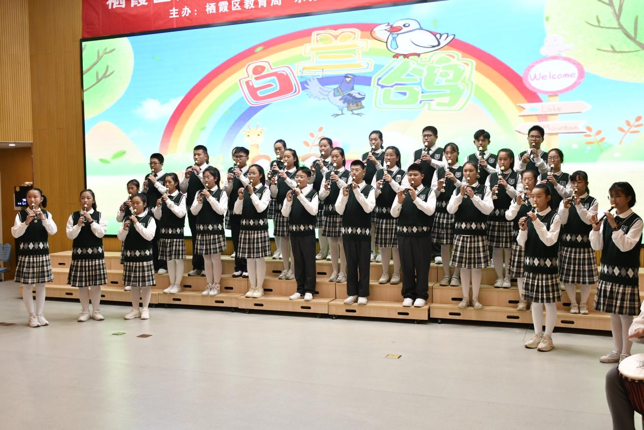 2_【博学广志】笛韵悠悠伴成长——栖霞区第三届中小学课堂小乐器合奏比赛_html_2006d774.jpg