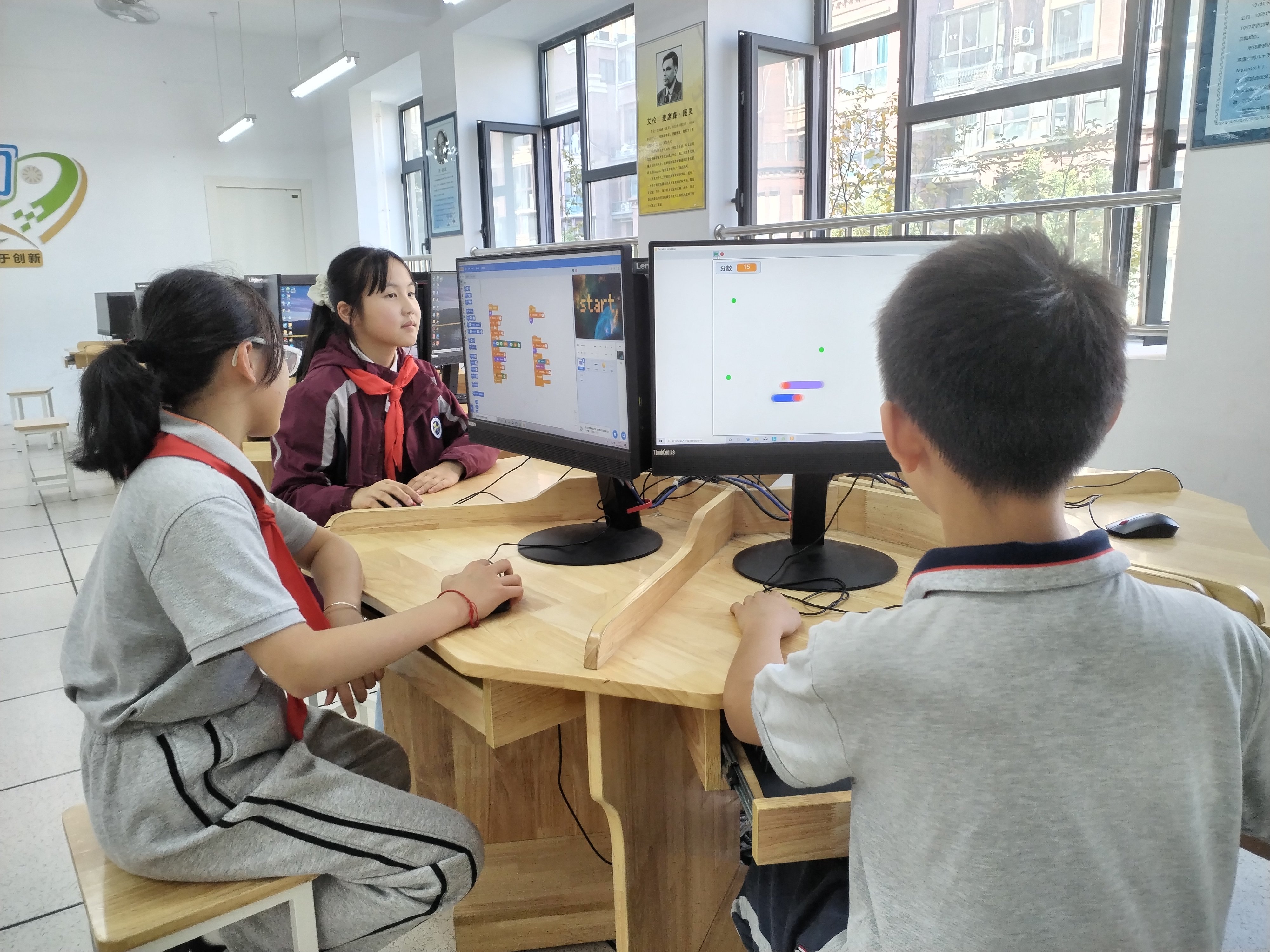 【博学广志】趣味编程，开启创意之旅——记金陵小学（广志路校区）Scratch创意编程比赛_html_563edbfe.jpg
