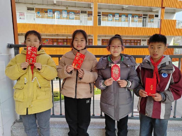 20250213蛇舞新岁启新程，校园筑梦正当时——南京市南湾营小学开学第一天_html_5ed67316.jpg