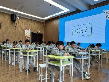 20240407启智珠算节一年级年级赛报道_html_mf3b8b5d.jpg