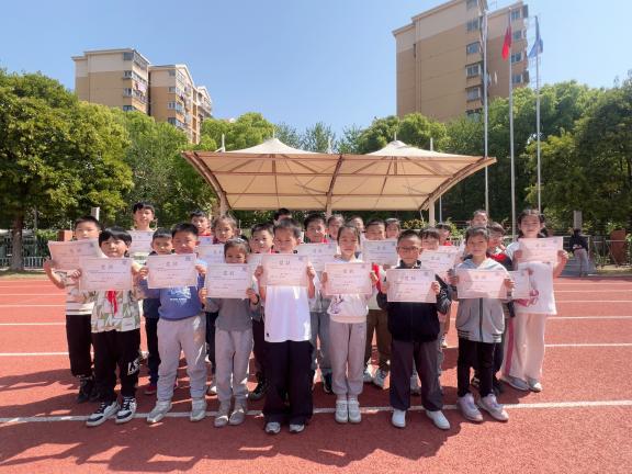 20250415传承古老智慧，绽放思维光芒——南京市南湾营小学第四届启智珠算节闭幕式（周悦写）_html_49b75072.jpg