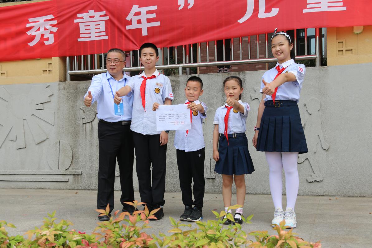 六一活动报道-改_html_m51038ba0.jpg