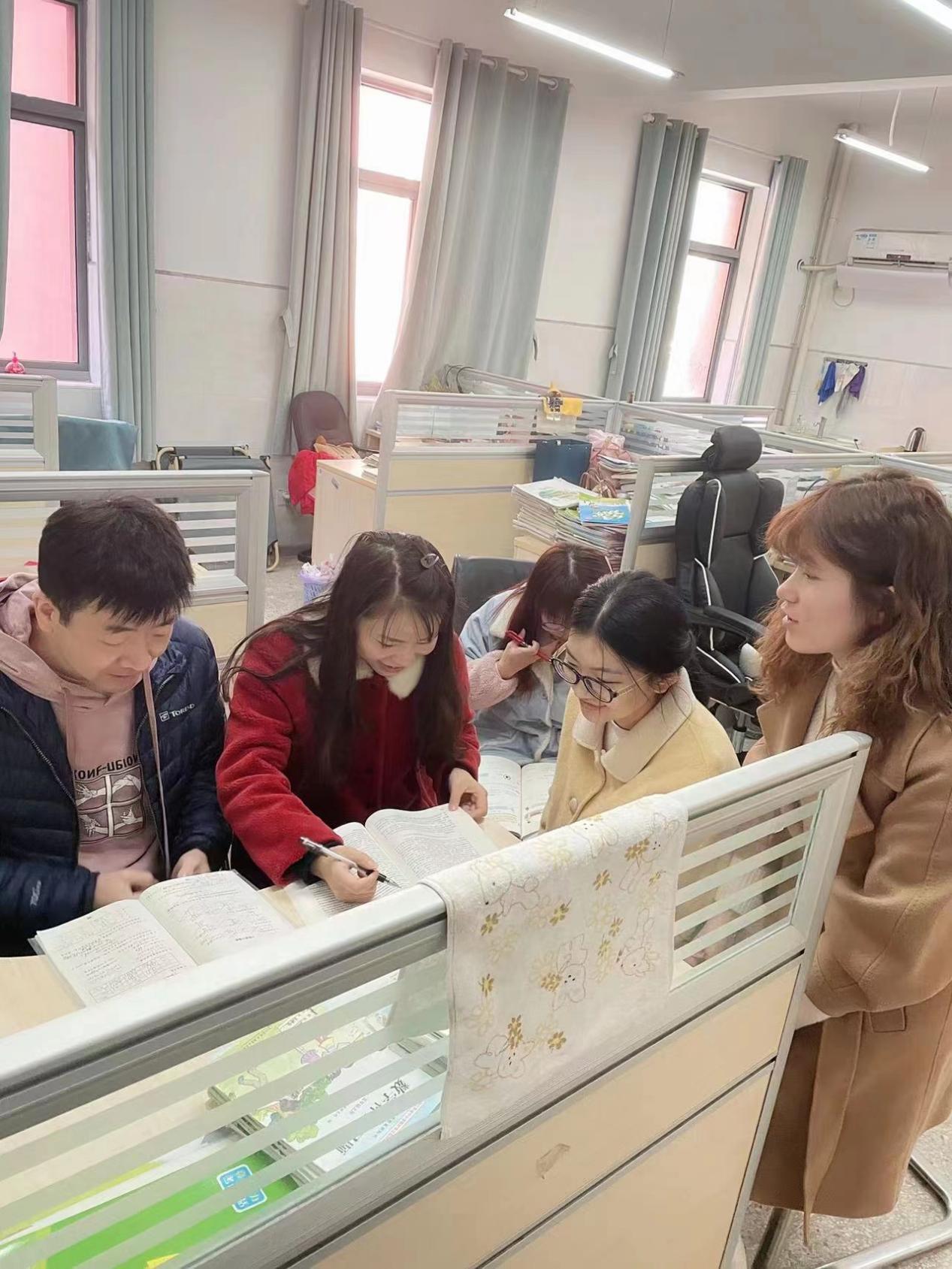 11.25集体备课报道_html_m4a77f227.jpg