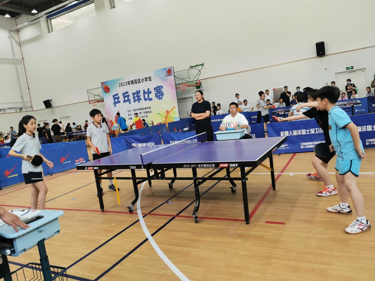 【湖畔光影】赛热情，展风采——记金陵小学（仙林湖校区）校级乒乓球队参加栖霞区小学生乒乓球比赛_html_4db1df93.jpg