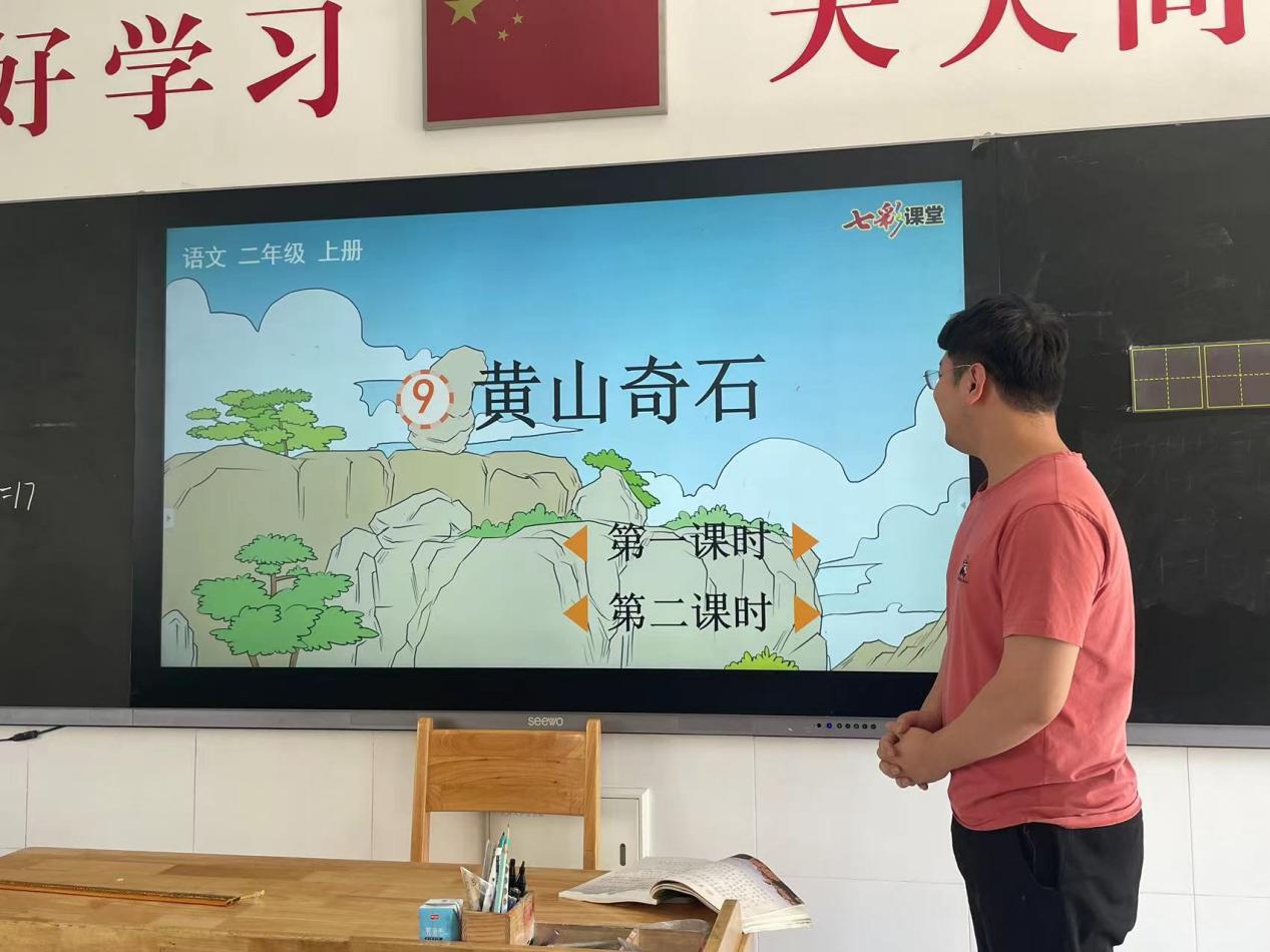 10.18语文第三次集体备课报道(1)_html_m74f57893.jpg