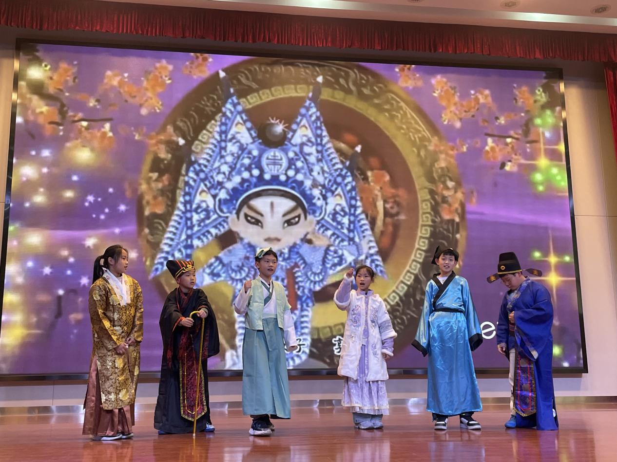【正学·丁三 教学】“讲好民间故事，传承经典文化”——丁家庄第三小学五年级读书节汇报(2)(1)_html_m50320e9b.jpg