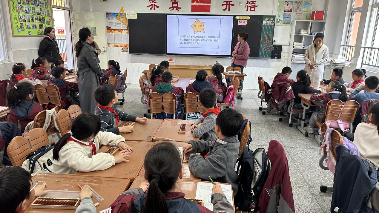 20240329启智珠算节三年级班级赛报道_html_m47c35da3.jpg