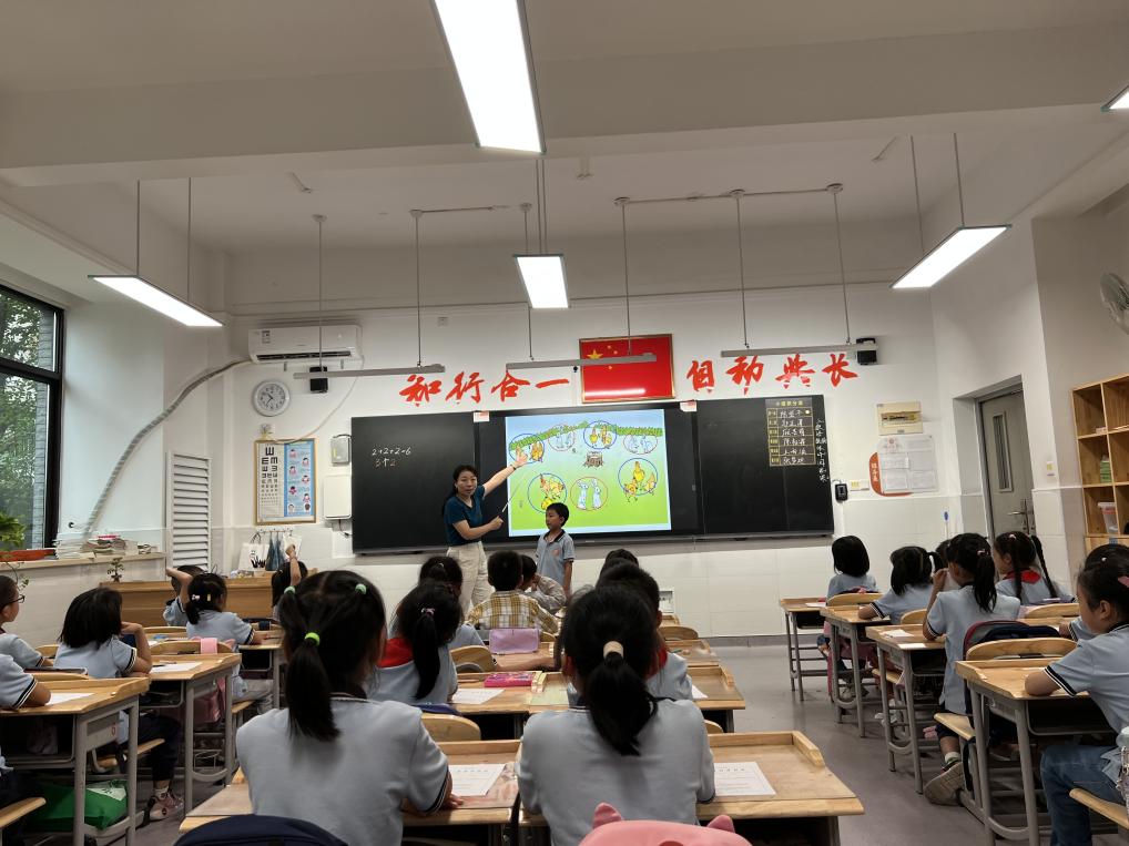 南京市晓庄小学数学组校本教研主题活动（一）_html_m6f0098d3.jpg