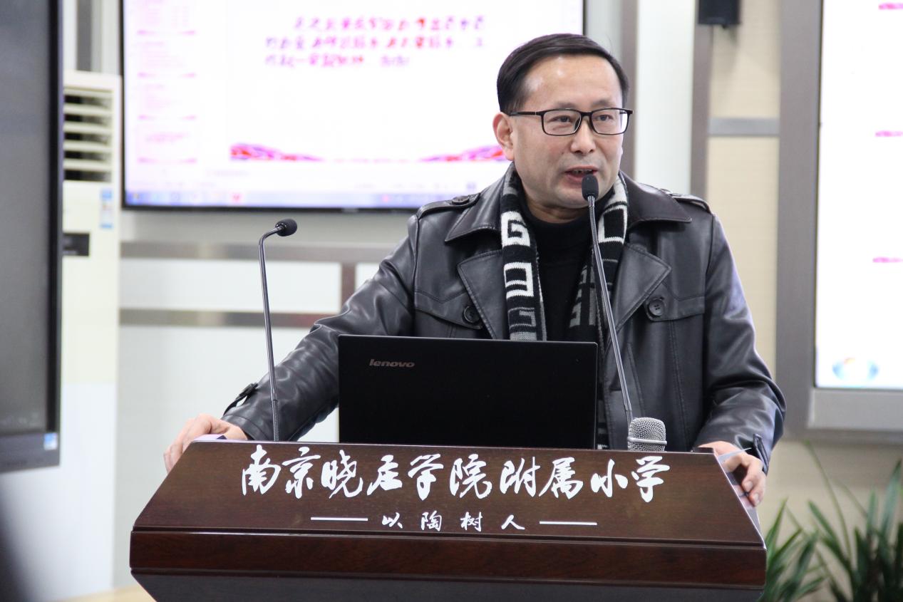 1.2月12日教师大会-改_html_5c311844.jpg