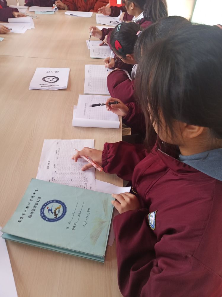 八卦洲中学中学图书馆班级图书角图书清理会议_html_m41601608.jpg