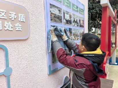 20250305小小雷锋在行动，清洁家园暖人心（周悦写）_html_228f2e1e.jpg