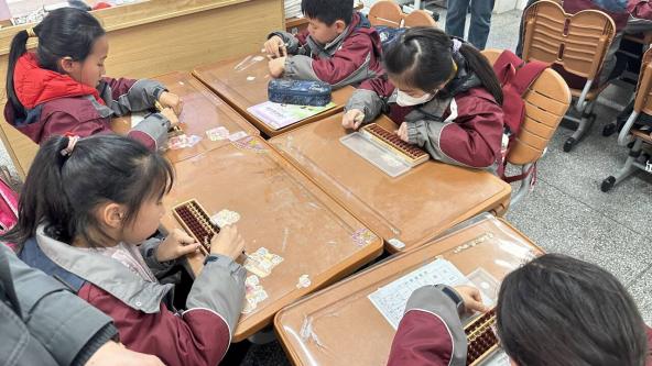 20240329启智珠算节三年级班级赛报道_html_3ed8e620.jpg