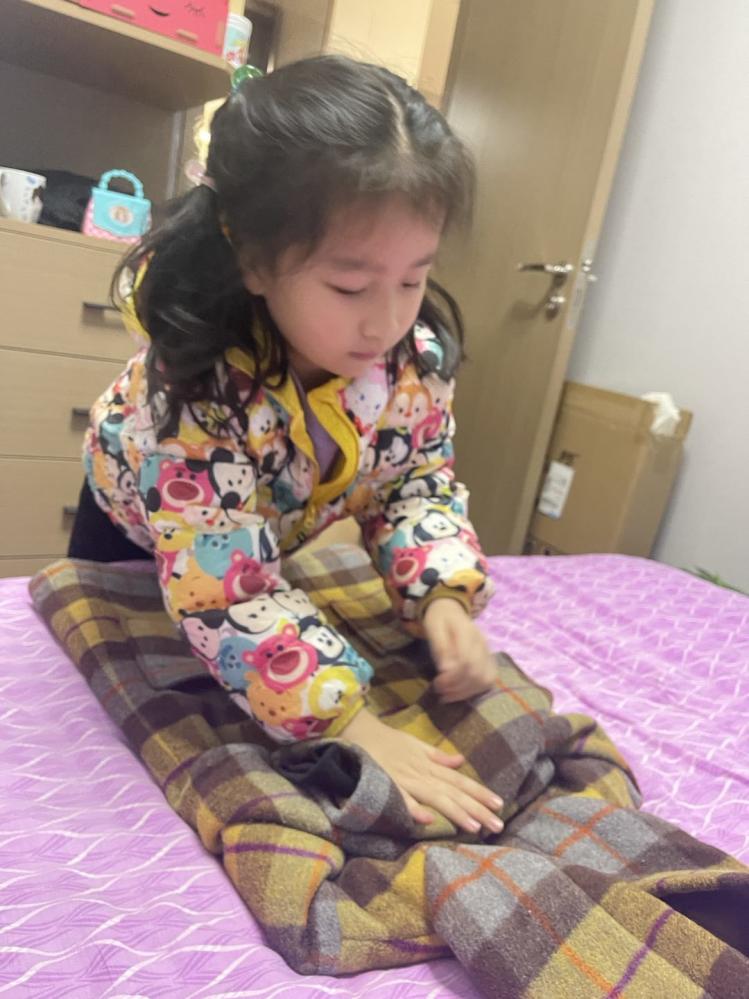 2023.1.15叠衣服新闻稿(1)_html_31692303.jpg