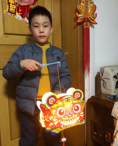 其乐融融迎佳节  虎虎生威闹元宵——晓院附小二（3）班开展元宵节生活实践活动_html_2003c7e5.jpg