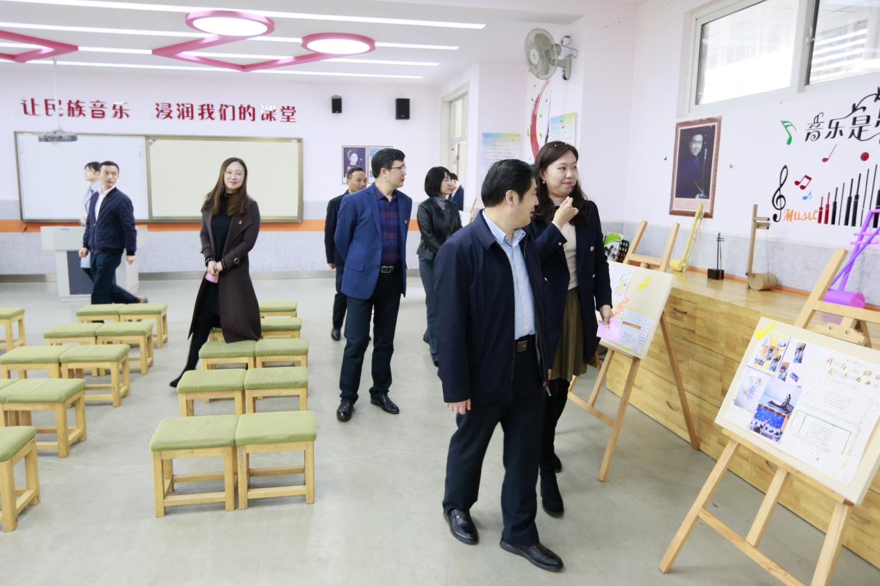 11.29省民委视察南京市丁家庄小学“红石榴家园”创建工作_html_m1101e9fb.jpg