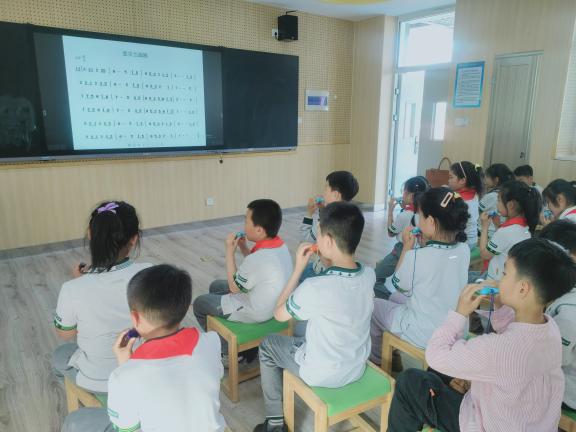 社团报道1_html_m20ed559a.jpg