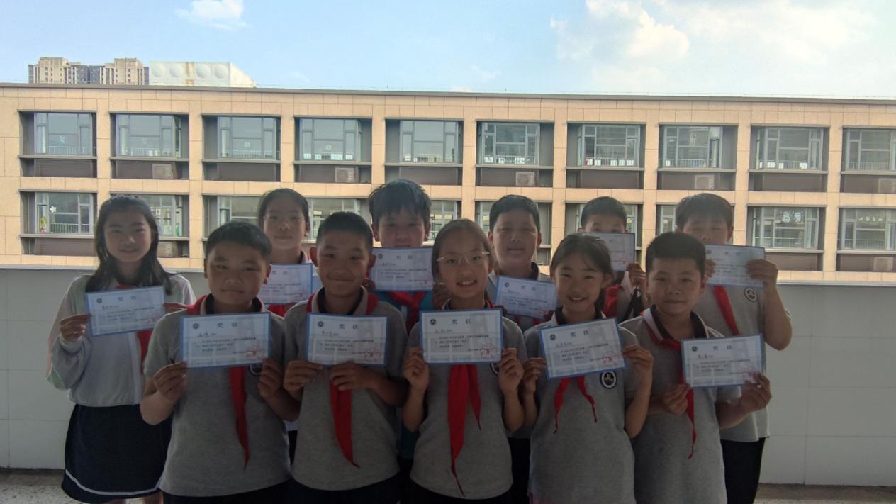 【博学广志】“比”出速度 “算”出精彩——金陵小学广志路校区五年级“争当计算小能手”数学单项竞赛_html_2014bdac.jpg