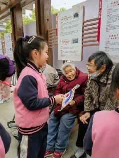 【生活燕幼】燕幼中心园“与星同行，用爱唤醒”——关爱自闭症儿童社区宣传活动_html_332f77cd.jpg