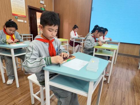 20240411启智珠算节三年级年级赛报道_html_m4101f84c.jpg