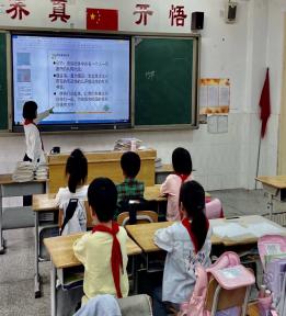 20210521栖生态垃圾分类环保班会课报道_html_m19f2abe8.jpg
