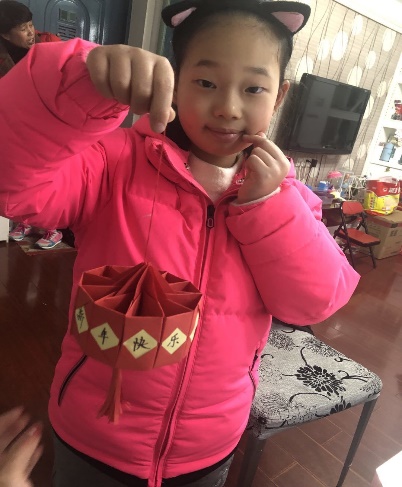 其乐融融迎佳节  虎虎生威闹元宵——晓院附小二（3）班开展元宵节生活实践活动_html_369abac6.jpg