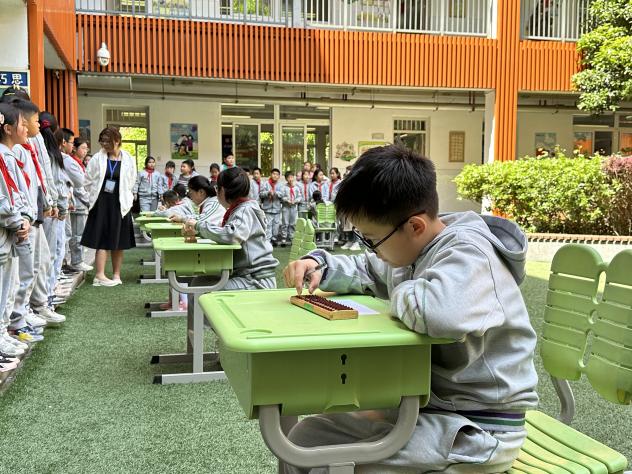 20240418启智珠算节报道_html_359e8920.jpg