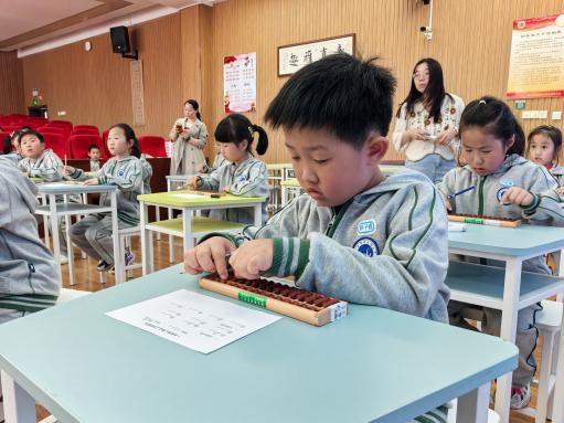 20250326一年级个人珠心算比赛报道（孙素芸写）_html_6ad1260c.jpg