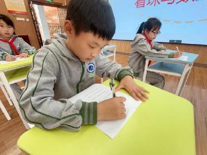 20250409四五年级看珠写数比赛新闻稿 (1)_html_m3c398840.jpg