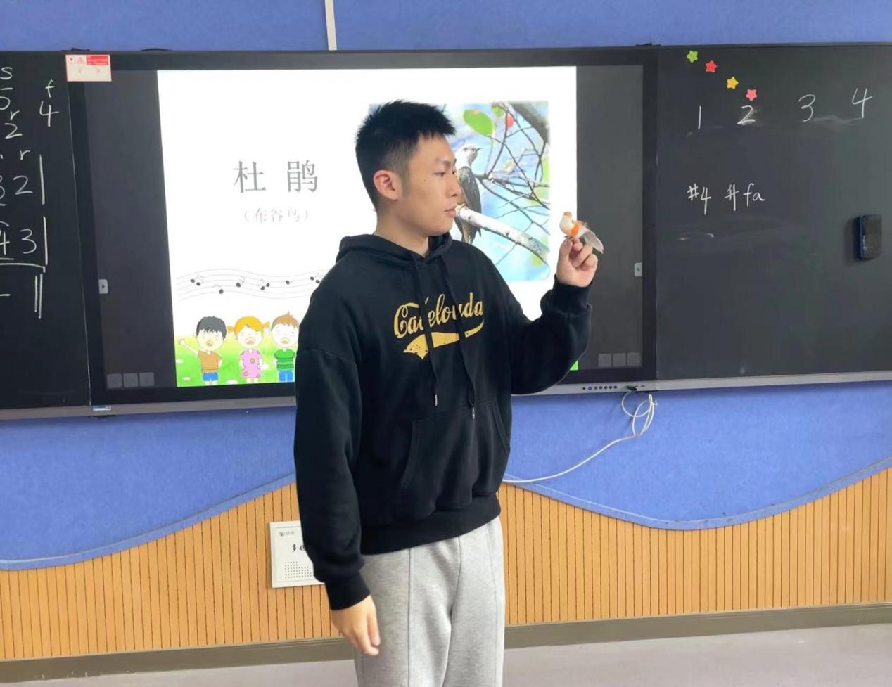 潜心音乐教研，引领高效课堂——记南京市晓庄小学音乐校本教研活动_html_m4843d222.jpg