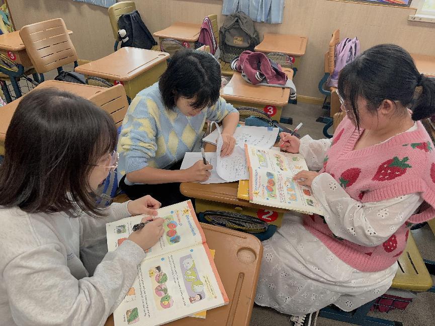 10.10英语组第三次集体备课报道  胡静_html_4c017976.jpg