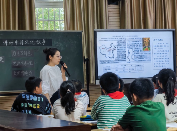 完善“一个经验”，深化课标实践——栖霞区小学语文高年段主题教研暨黄文峰名师工作室主题活动_html_m3d989f35.jpg