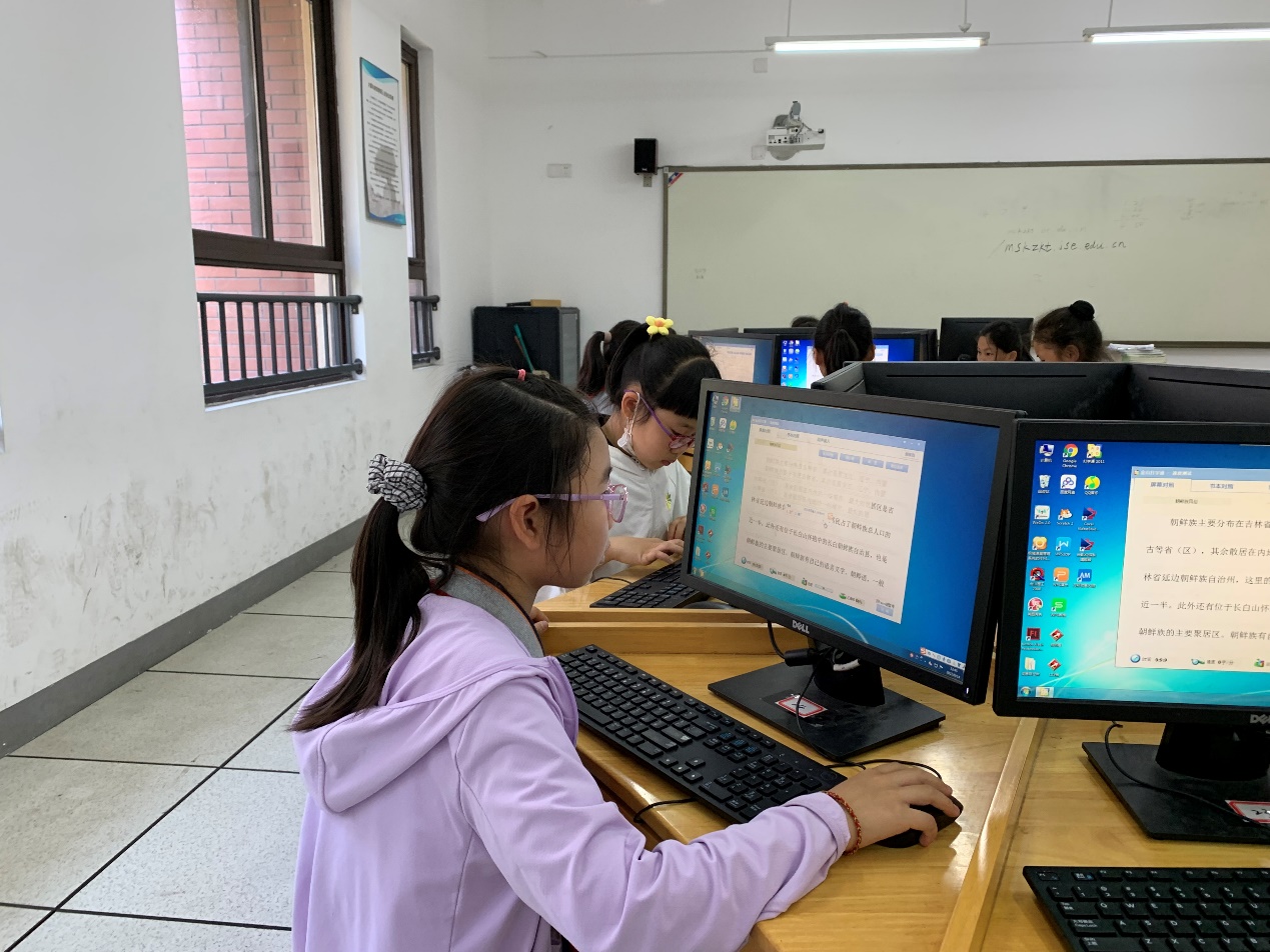 【湖畔光影】指尖飞扬，运指如飞——记金陵小学（仙林湖校区）第三届科技活动周之打字比赛_html_24ce8d64.jpg