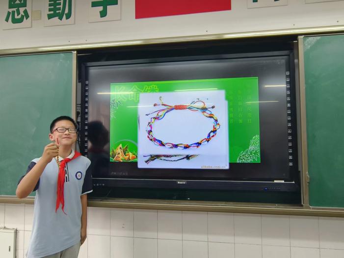 【尚真华电】巧手爱劳动，“粽”享端午情——华电中学开展端午节传统文化教育系列活动_html_697a7578.jpg