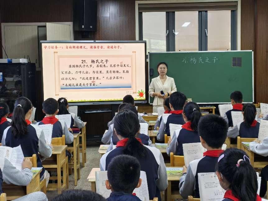 赛课新闻稿_html_251a27ae.jpg