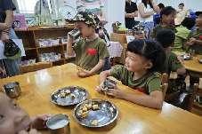 20240929“迷彩萌娃迎国庆，亲子运动两亮风采”—动感亲子体育节暨迎国庆家长半日开放活动_html_2e3ad09e.jpg